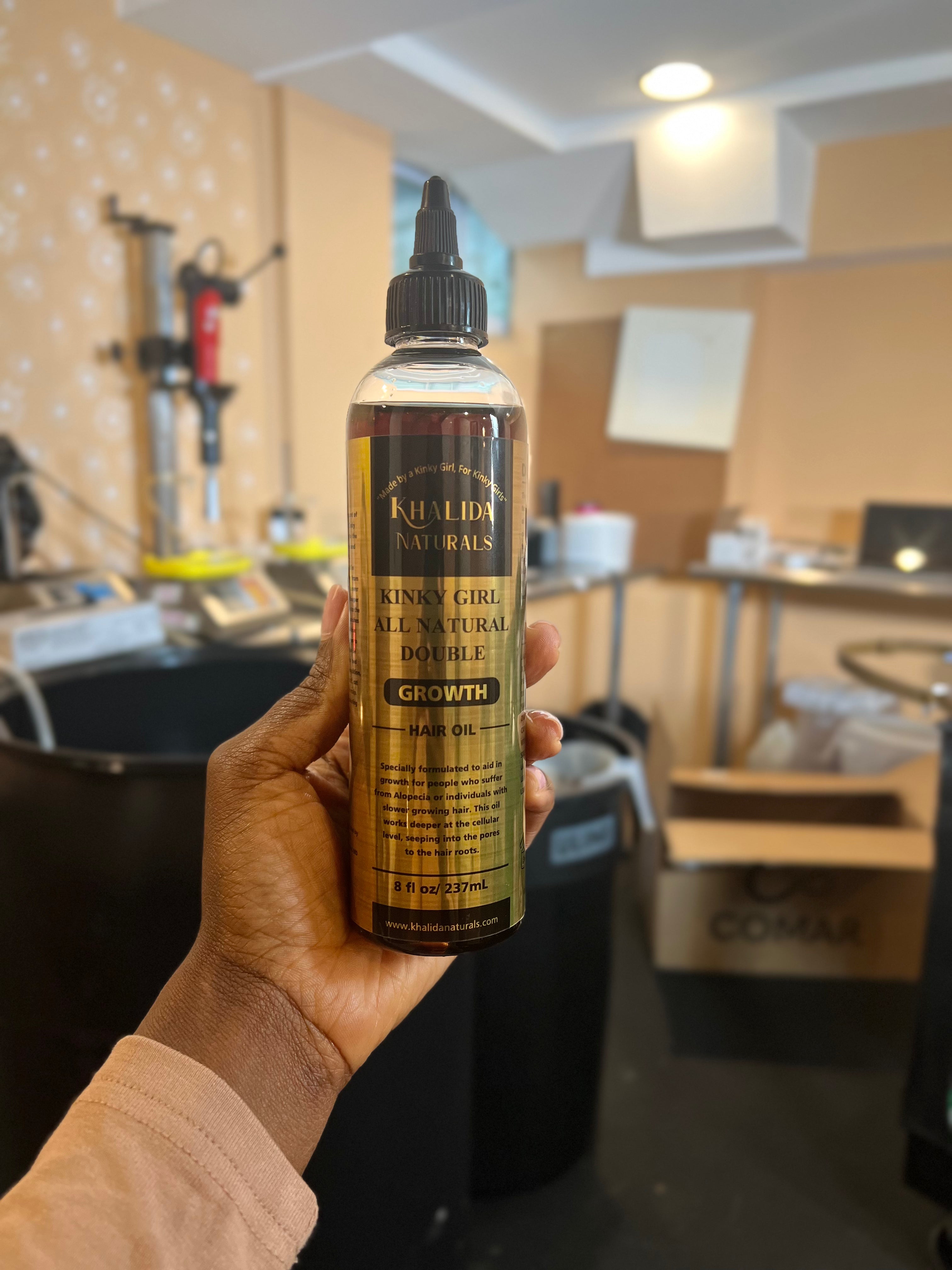 Double Growth Hair Oil formulated with natural ingredients to boost hair growth, strengthen strands, and nourish kinky, coily, and curly textures for healthier hair. Alopecia, hair growth
